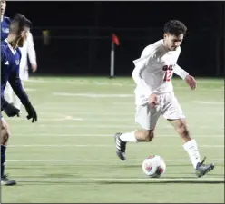  ?? MIKE BUSH/NEWS-SENTINEL ?? Galt forward Arath Chavez moves the ball past a Venture Academy player in Tuesday's Sac-Joaquin Section Division IV boys soccer semifinal playoff game at Walker Park. Chavez, a senior, scored three goals.