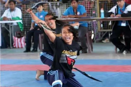  ?? Photo by Milo Brioso ?? SOARING CARDINALS. After emerging as one of the top medal producers for Baguio in the recently concluded CARAA meet in Abra, the UB Cardinals hogged the limelight anew, this time, by dominating the arnis event in the season 30 of the BBEAL.