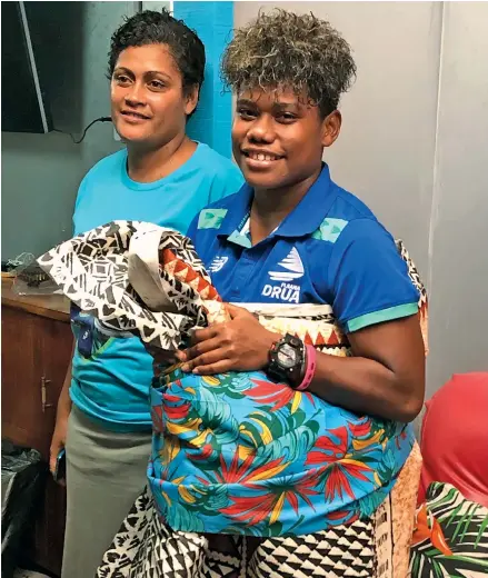  ?? Photo: Sereana Salalo ?? Rooster Chicken Fijiana Drua winger Vitalina Naikore (right) at Milverton Road, Raiwaqa, on May 13, 2022.