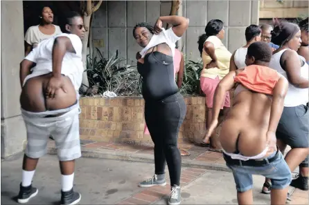  ?? PICTURE: BONGANI SHILUBANE ?? EXPOSED: A disgruntle­d group of women stripped and stormed into the ANC’s Tshwane regional offices yesterday, protesting about alleged attacks that took place at a branch meeting in Hammanskra­al at the weekend.