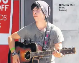  ??  ?? X Factor Evans busking Marc