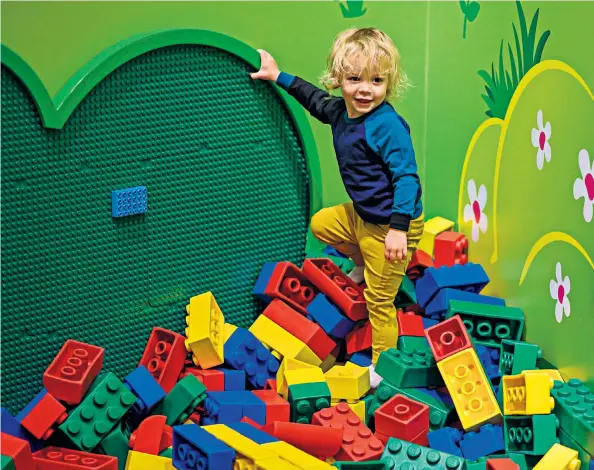  ??  ?? i Bright and beautiful: getting lost in a world of Lego – at Legoland Discovery Centres in Manchester and Birmingham – is a safe bet for toddlers and parents in a summer when the weather can ruin best-laid plans