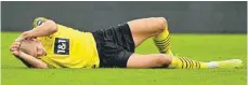  ?? FOTO: INA FASSBENDER/AFP ?? „Viel zu viel, viel zu früh und viel zu viel Stress“: Der verletzte Erling Haaland fehlt Borussia Dortmund auch in Lissabon.