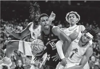  ?? Wesley Hitt/getty Images ?? Texas A&M’S Henry Coleman III tallied a double-double with 18 points and 15 rebounds Tuesday night, but it wasn’t enough as the Aggies lost at Arkansas to fall to 7-2 in SEC play.