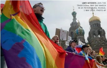  ??  ?? LGBTI ACTIVISTS JOIN THE TRADITIONA­L MAY DAY MARCH IN ST PETERSBURG, RUSSIA,
1 MAY 2015. PHOTO AP