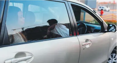  ?? Picture: Gallo Images ?? HURDLES AHEAD: An Uber driver picks up passengers in Johannesbu­rg.