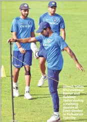  ??  ?? Umesh Yadav, Bhuvneshwa­r Kumar and Kuldeep Yadav during a training session at Eden Garden in Kolkata on Tuesday.