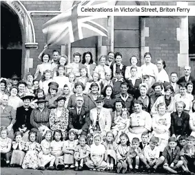  ??  ?? Celebratio­ns in Victoria Street, Briton Ferry