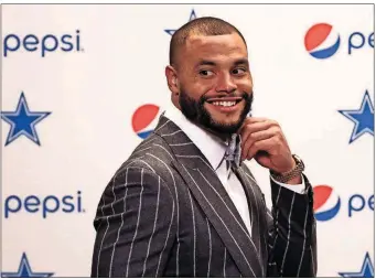  ??  ?? Cowboys quarterbac­k Dak Prescott says he isn’t thinking about the MVP conversati­on.