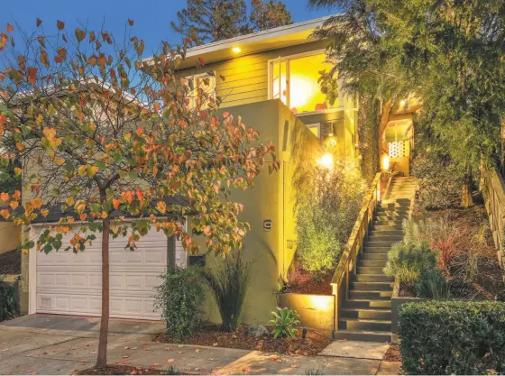  ?? Liz Rusby / the Grubb Co. ?? The redesigned three-bedroom Midcentury at 9 Whittle Court in Oakland is available for $799,000.