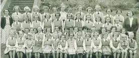  ?? Photo / Thomas Metcalf, courtesy of Mrs Gillian Corballis ?? Christ Church Preparator­y School for Girls, 1951. Head teacher Mrs Robinson is in the centre of the back row. Gillian Higgs is standing to her left.