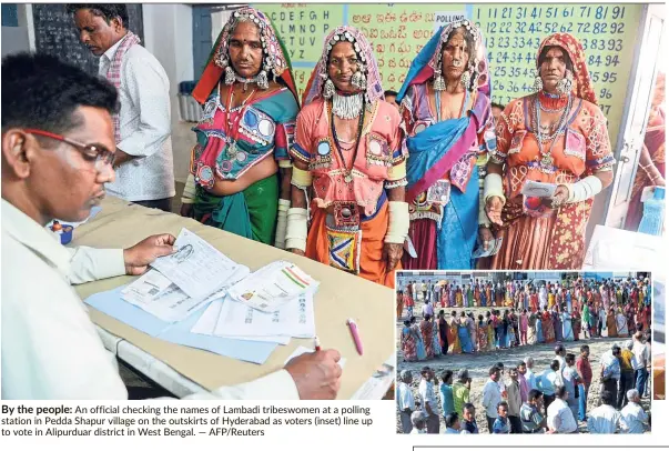  ?? — AFP/Reuters ?? By the people: An official checking the names of Lambadi tribeswome­n at a polling station in Pedda Shapur village on the outskirts of Hyderabad as voters (inset) line up to vote in Alipurduar district in West Bengal.