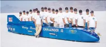  ?? BUBB LANNAN/THOMPSON LSR ?? Danny Thompson, foreground, and the crew of the Challenger 2 at the Bonneville Salt Flats in Utah. He has set an unofficial land speed record of 725 km/h in his late father’s vehicle.