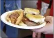  ?? FILE PHOTO ?? Hot dog and sliders are hot off the grill at Jack’s Drive In.