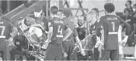  ?? JOHN RAOUX/AP ?? Inter Miami’s Andres Reyes, left, is taken off the field after he as injured during the second half of an MLS match against Orlando City on Wednesday.