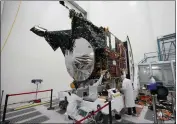  ?? MARCIO JOSE SANCHEZ — THE ASSOCIATED PRESS ?? Technician­s work on the Psyche spacecraft at the NASA Jet Propulsion Laboratory in La Cañada Flintridge.