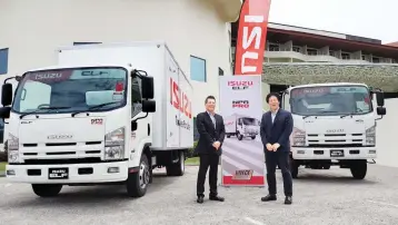  ??  ?? Pictured with the new 2017 Isuzu ELF are (on left), CEO of Isuzu Malaysia Kenji Matsuoka together with Isuzu Malaysia’s Executive Director Mikio Tsukui.