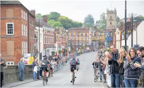  ??  ?? > Some of the cyclist making their way through Bewdley