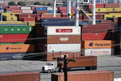  ?? Frederic J. Brown / AFP / Tribune News Service ?? Shipping containers were stacked high at the Port of Los Angeles in April, where records continue to be set for cargo at the nation's No. 1 container port. Every major ocean shipping company, trucking firm and warehouse company are making money.