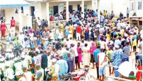  ?? PHOTO: NAN ?? Voters wait to be accredited at Ajilosun in Ado-Ekiti yesterday, during the governorsh­ip election in Ekiti State