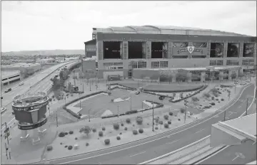  ?? Ap-ross D. Franklin, AP File ?? Chase Field, home to the Arizona Diamondbac­ks, is within about 50 miles of 10 spring training ballparks in Phoenix, Arizona. MLB is looking at options for how to go forward with the 2020 season.