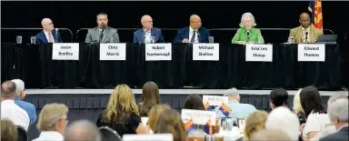  ?? Buy this photo at YumaSun.com PHOTO BY RANDY HOEFT/YUMA SUN ?? CANDIDATES FOR YUMA CITY COUNCIL (FROM LEFT) Jason Bradley, Chris Morris, Robert Scarboroug­h, incumbent Michael Shelton and incumbent Edward Thomas (far right) listen as candidate Ema Lea Shoop speaks during Thursday afternoon’s forum, hosted by the Yuma County Chamber of Commerce at the Yuma Civic Center.