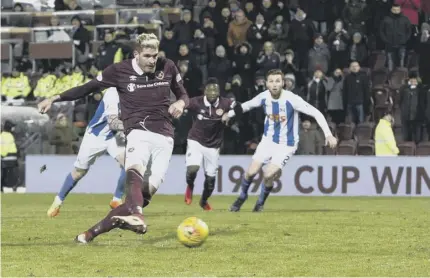  ??  ?? 2 Kyle Lafferty squanders Hearts’ spot-kick in time added on last night, Kilmarnock’s former Tynecastle keeper Jamie Macdonald denying the striker.