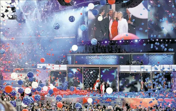  ?? Matt Freed/Post-Gazette photos ?? Balloons drop on Hillary Clinton at the end of the final day of the Democratic National Convention Thursday at Wells Fargo Center in Philadelph­ia.