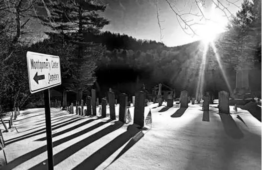  ?? MICHAEL PANAGAKO ?? The moon rises over a snow-covered Montgomery Center Cemetery in Montgomery, Vt.