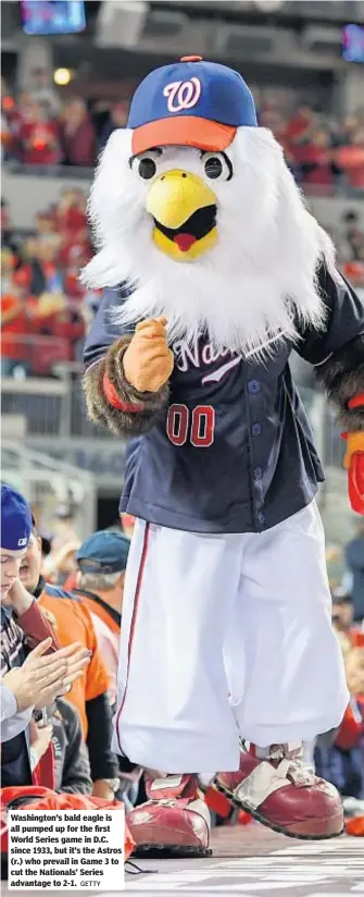  ?? GETTY ?? Washington’s bald eagle is all pumped up for the first World Series game in D.C. since 1933, but it’s the Astros (r.) who prevail in Game 3 to cut the Nationals’ Series advantage to 2-1.