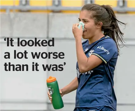  ?? PHOTOSPORT ?? Phoenix player Chloe Knott copped a lucky break when clashing heads with a rival. Instead of a broken nose, Knott appears to have escaped with only a minor injury.