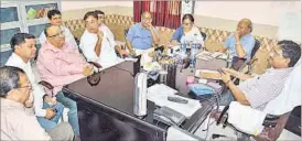  ?? HTPHOTO ?? Officials holding a discussion about reopening of Gumnami Baba’s boxes.