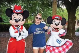  ??  ?? Pottstown School District Elementary Special Education Supervisor Dulcie E. Rothermel shares some of her We Are Pottstown Pride in Disney World with Mickey and Minnie.