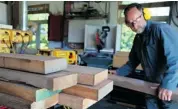  ??  ?? Steve Maxwell planes two-inch-thick cherry boards for making a kitchen table for his growing family.