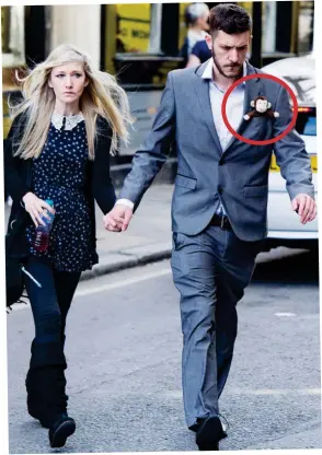 ??  ?? Legal battle: Parents Connie Yates and Chris Gard – with Charlie’s soft toy in his pocket, circled – arriving at the High Court yesterday