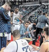  ?? NIAGARA RIVER LIONS ?? Victor Raso, addressing players during a timeout, is returning for a second season as general manager and head coach of the Niagara River Lions after earning Canadian Elite Basketball League coach of the year honours.