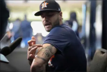  ?? DAVID J. PHILLIP — THE ASSOCIATED PRESS ?? Houston Astros starting pitcher Lance Mccullers Jr. displays his tattoos ahead of Game 1 of the World Series on Thursday. Mccullers is slated to start Game 3 for Houston.