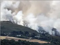  ??  ?? Gorse fire raging on Bray Head in mid-July.