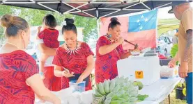  ?? ?? A range of delicious traditiona­l Samoan food was also available on the day.