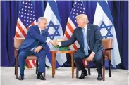  ?? EVAN VUCCI/ASSOCIATED PRESS ?? President Donald Trump greets Israeli Prime Minister Benjamin Netanyahu at the U.N. Wednesday.