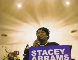  ?? Alyssa Pointer Atlanta Journal-Constituti­on ?? STACEY ABRAMS’ supporters repeatedly mentioned Gov.-elect Brian Kemp in the lawsuit. They say voter suppressio­n especially harmed people of color.