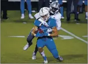  ?? JOHN LOCHER — THE ASSOCIATED PRESS ?? San Jose State wide receiver Bailey Gaither (84) catches a pass in front of Nevada defensive back Mikael Bradford during the second half Friday in Las Vegas.