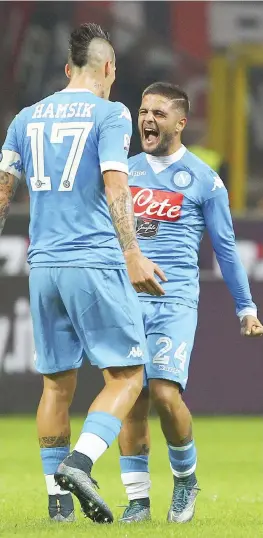  ?? GETTY IMAGES ?? La gioia di Hamsik e Insigne dopo il 3-0 del Napoli