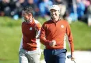  ?? Photograph: David Davies/PA ?? Rory McIlroy and Sergio García celebrate a birdie in the Ryder Cup fourballs in 2018.