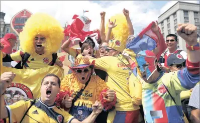  ?? PICTURE: EPA-EFE ?? Colombia’s fans cheer near Red Square in the centre of Moscow, Russia, yesterday. The Fifa World Cup 2018 begins in Russia today.