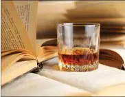  ??  ?? Booze and writing: A temptation distilled