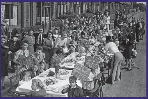  ??  ?? JOY AT LAST: Grateful families celebrate VJ Day in Selly Oak, Birmingham, with a street party on August 15, 1945