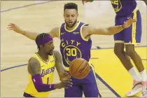  ?? JANE TYSKA — BAY AREA NEWS GROUP ?? Golden State Warriors’ Stephen Curry (30) guards Los Angeles Lakers’ Kentavious Caldwell-Pope (1) in the first quarter at the Chase Center in San Francisco on Monday.