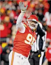  ?? Kevin C. Cox/Getty Images ?? The Kansas City Chiefs’ Chris Jones reacts after making a sack against the Cincinnati Bengals during the fourth quarter in the AFC Championsh­ip Game at GEHA Field at Arrowhead Stadium on Jan. 29 in Kansas City, Mo.
