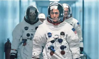  ?? DANIEL MCFADDEN/UNIVERSAL PICTURES ?? Ryan Gosling plays astronaut Neil Armstrong in “First Man.”